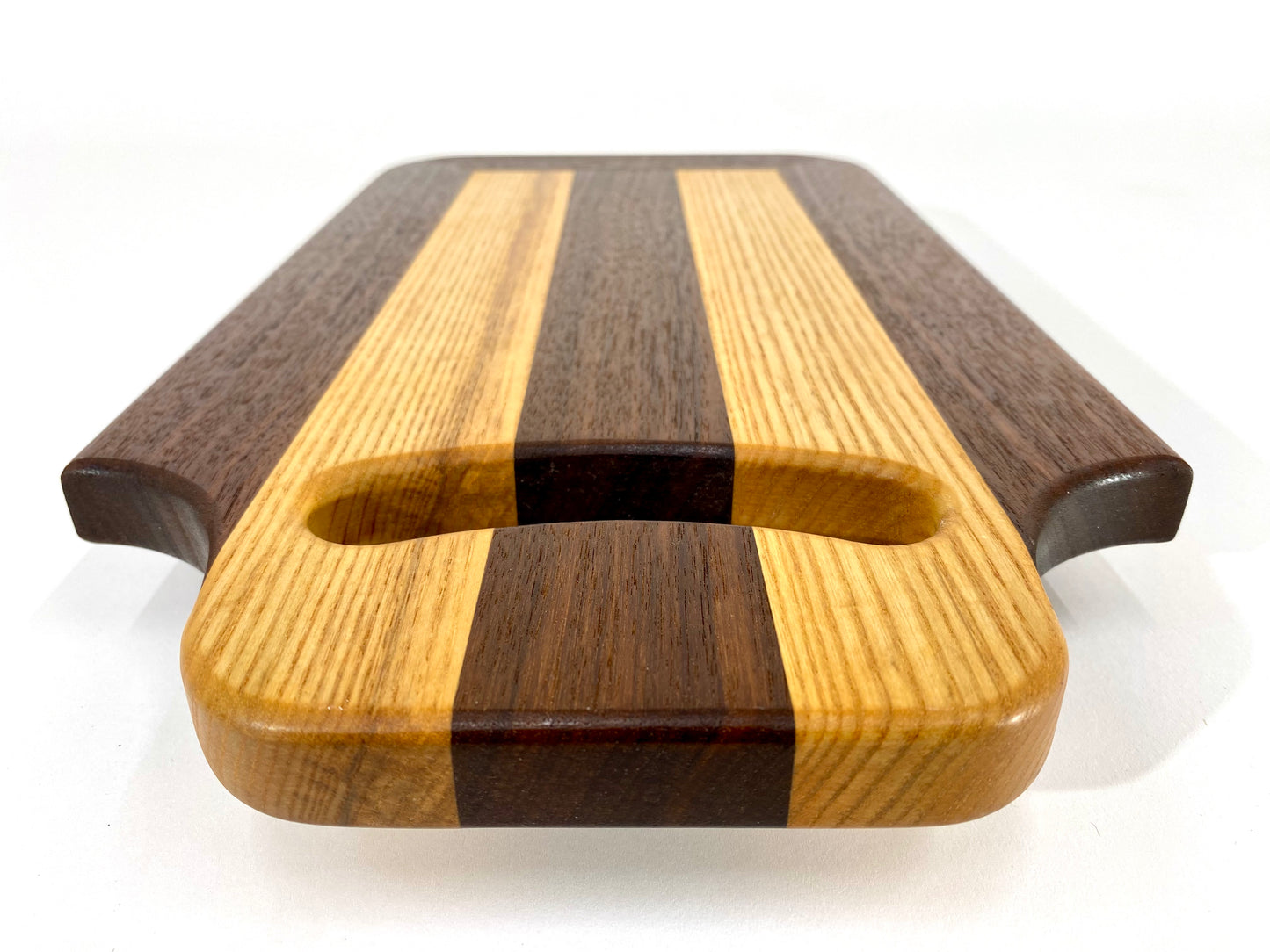 Walnut and Ash cutting board with handle.