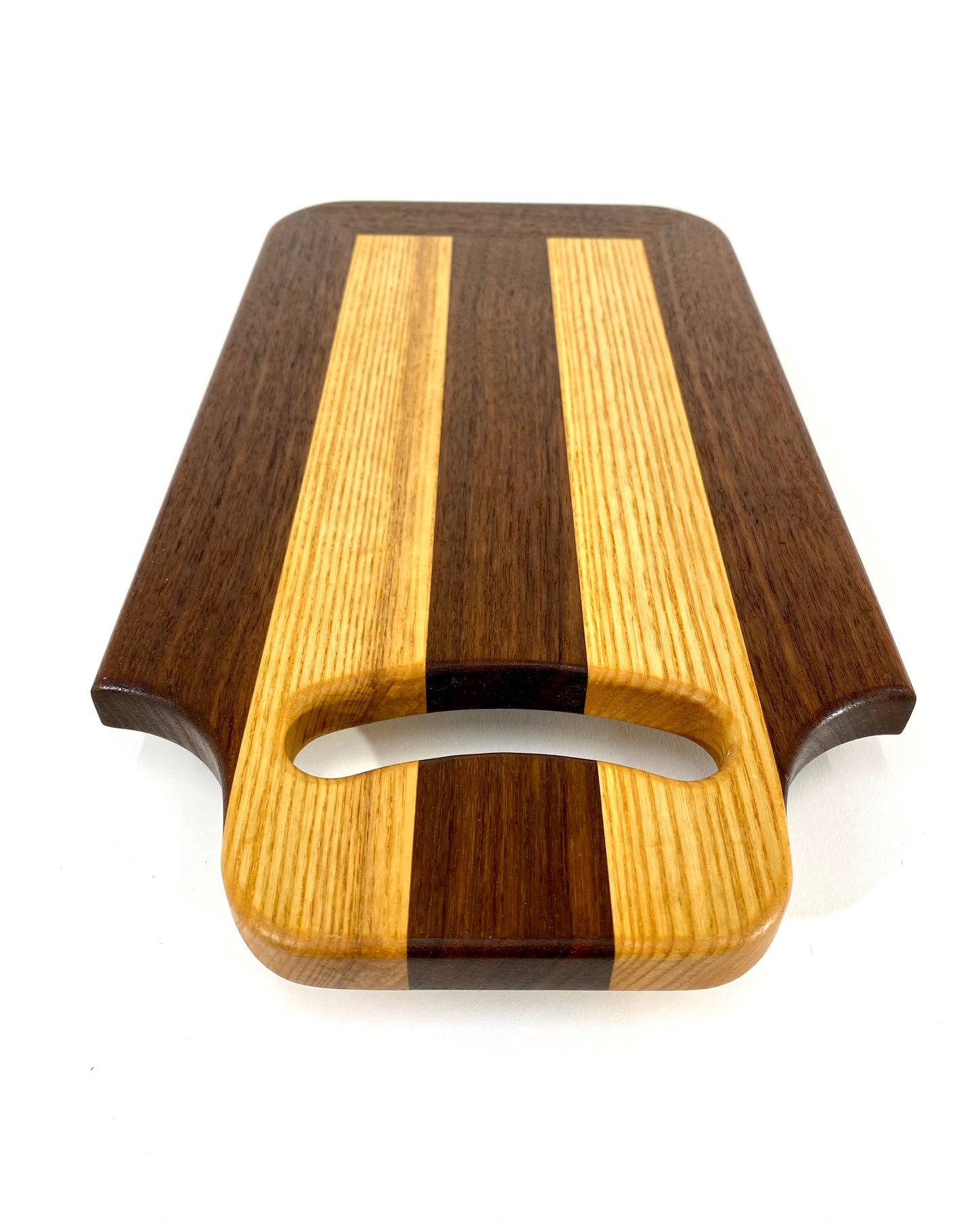 Walnut and Ash cutting board with handle.