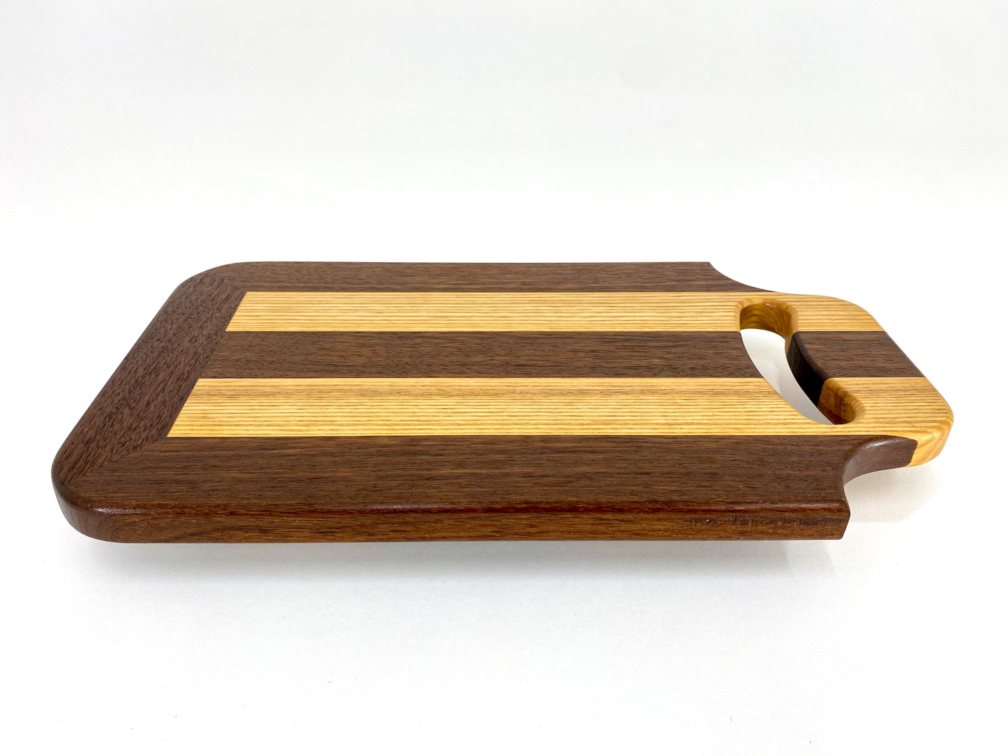 Walnut and Ash cutting board with handle.