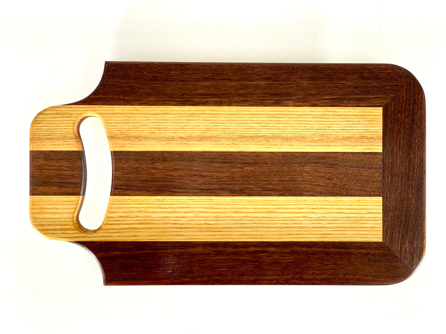 Walnut and Ash cutting board with handle.