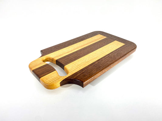 Walnut and Ash cutting board with handle.